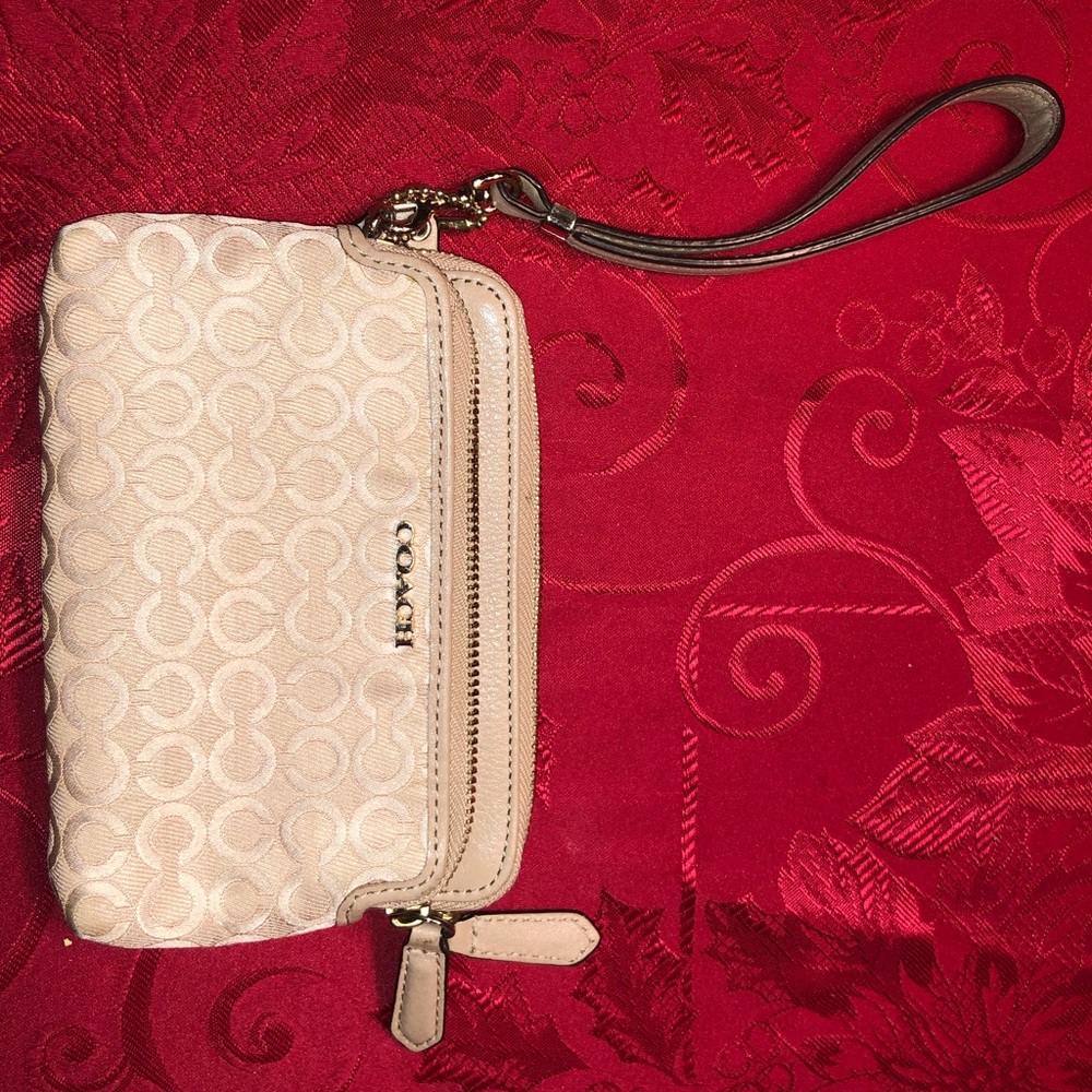 Beige coach wristlet